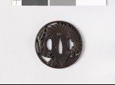 Round tsuba with chrysanthemum flower and leaves (EAX.10486)
