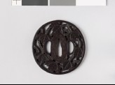 Tsuba with paulownia flowers and leaves