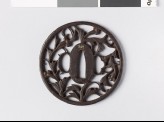 Round tsuba with karakusa, or scrolling plant pattern (EAX.10497)