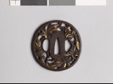 Tsuba with branches and leaves from a maple tree