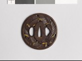 Tsuba with overlapping chestnut leaves