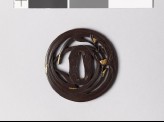 Tsuba with orchis plant