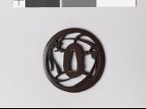 Lenticular tsuba with two iris plants