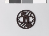 Tsuba with mon of swastika and hawk feathers