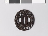 Tsuba with blossoming plum tree