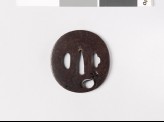 Lenticular tsuba with money bag