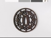 Round tsuba with gosan-no-kiri, or paulownia leaves