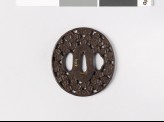 Tsuba with plum blossoms (EAX.10623)
