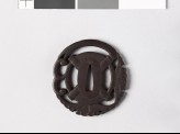 Tsuba in the form of a mamori mon