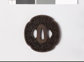 Mokkō-shaped tsuba with rinzu, or swastika-fret diaper