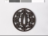 Round tsuba with floriated cusps