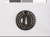 Lenticular tsuba with sagari-fuji mon