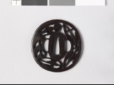 Tsuba with heraldic hawk feathers and ground bamboo (EAX.10690)