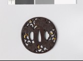 Tsuba with Cissus leaves and karakusa, or scrolling plant pattern