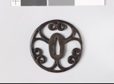 Round tsuba with scrolling cusps
