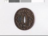 Tsuba with dragons and karakusa, or scrolling plant pattern (EAX.10792)