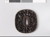 Tsuba with two dragons amid karakusa, or scrolling plant pattern (EAX.10796)