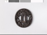 Tsuba with two dragons amid karakusa, or scrolling plant pattern (EAX.10798)