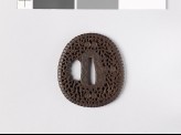 Lenticular, aori-shaped tsuba with floral scrollwork