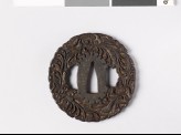 Tsuba with leaves and branching tendrils