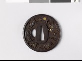 Round tsuba with animals of the Chinese zodiac amid rocks