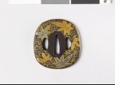 Aori-shaped tsuba with maple leaves on water
