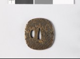 Tsuba with hanawachigai, or interlaced circles enclosing karahana