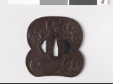 Tsuba with plum blossoms (EAX.10957)