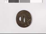 Tsuba depicting a Chinese fisherman on a river bank