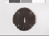 Aoi-shaped tsuba with silver rim