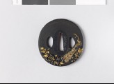 Tsuba with peacock among peonies and rocks (EAX.11024)