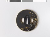 Tsuba with blossoming plum tree