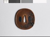 Tsuba with blossoming plum tree