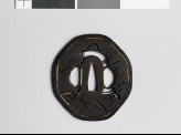 Octagonal tsuba depicting Yamabushi, or itinerant friars, carrying a portable book box (EAX.11090)