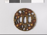 Tsuba with blossoming plum tree