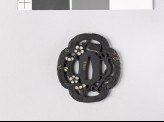Mokkō-shaped tsuba with rain dragon and blossoming plum tree