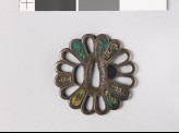 Tsuba in the form of a chrysanthemum mon