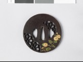 Round tsuba with chrysanthemum mon