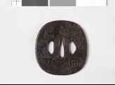 Tsuba with Genjimon and mon made from kiri, or paulownia leaves