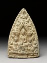 Votive plaque of the Buddha with attendant figures