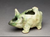 Oil lamp in the form of a piglet