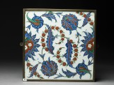 Tile with serrated leaves and flowers