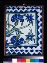 Frieze tile with carnations and irises