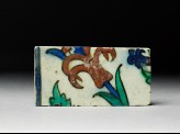 Tile fragment with tulip