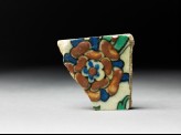 Tile fragment with flower