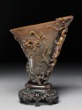 Rhinoceros horn libation cup with bronze-style decoration