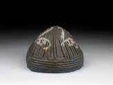 Cap with paired leaves