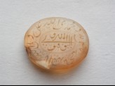 Oval bezel amulet with nasta’liq and thuluth inscription and concentric circle decoration