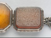 Octagonal bezel amulet from a bracelet, with thuluth inscription (LI1008.15)