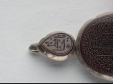 Heart-shaped bezel amulet from a bracelet, with naskhi inscription